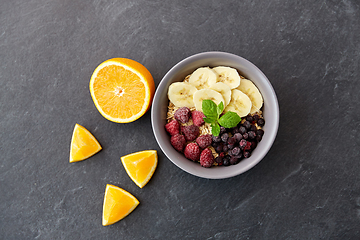 Image showing cereal with wild berries, fruits and peppermint