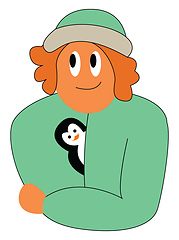 Image showing A girl wearing a beautiful green hat jacket and a cute penguin p