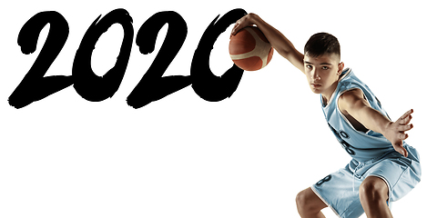 Image showing Full length portrait of a young basketball player with ball, meeting 2020