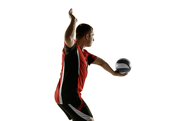 Image showing Young caucasian volleyball player placticing isolated on white background