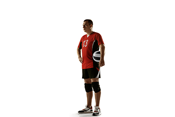 Image showing Young caucasian volleyball player placticing isolated on white background