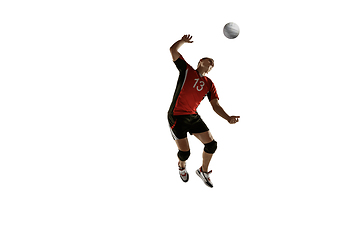 Image showing Young caucasian volleyball player placticing isolated on white background