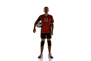 Image showing Young caucasian volleyball player placticing isolated on white background