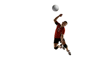 Image showing Young caucasian volleyball player placticing isolated on white background