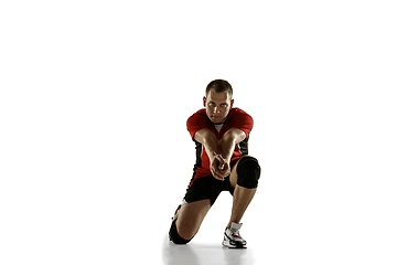 Image showing Young caucasian volleyball player placticing isolated on white background