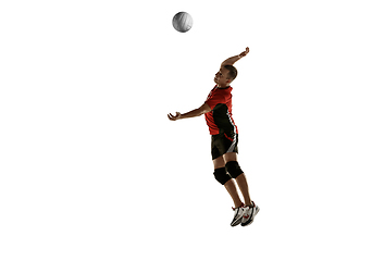 Image showing Young caucasian volleyball player placticing isolated on white background