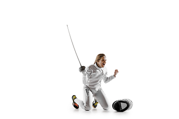 Image showing Teen girl in fencing costume with sword in hand isolated on white background