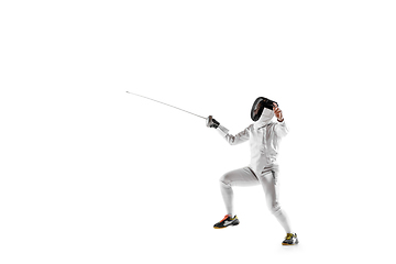 Image showing Teen girl in fencing costume with sword in hand isolated on white background