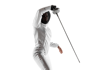 Image showing Teen girl in fencing costume with sword in hand isolated on white background