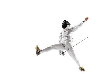 Image showing Teen girl in fencing costume with sword in hand isolated on white background