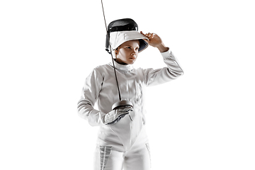 Image showing Teen girl in fencing costume with sword in hand isolated on white background