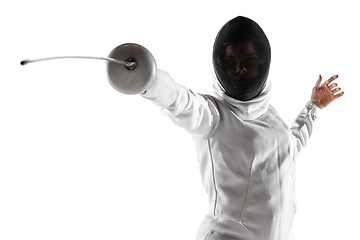 Image showing Teen girl in fencing costume with sword in hand isolated on white background