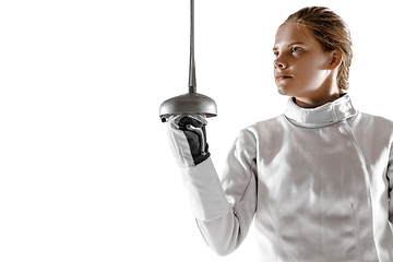 Image showing Teen girl in fencing costume with sword in hand isolated on white background