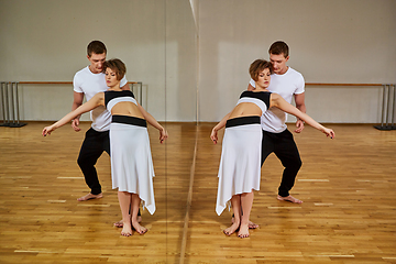 Image showing beautiful couple dancing tango