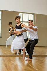 Image showing beautiful couple dancing tango