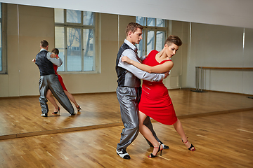 Image showing beautiful couple dancing tango