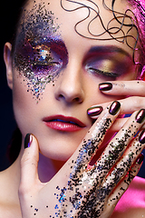 Image showing beautiful woman with bright makeup with glitter