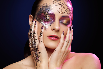 Image showing beautiful woman with bright makeup with glitter