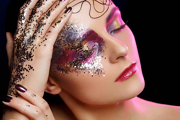 Image showing beautiful woman with bright makeup with glitter
