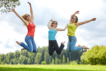 Image showing three girls having fun outdoors