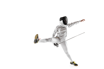 Image showing Teen girl in fencing costume with sword in hand isolated on white background