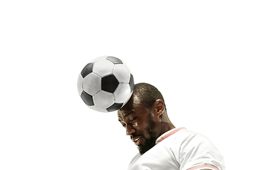 Image showing Close up of emotional man playing soccer hitting the ball with the head on isolated white background