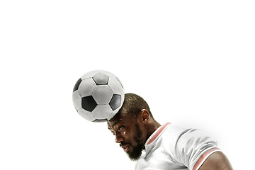 Image showing Close up of emotional man playing soccer hitting the ball with the head on isolated white background