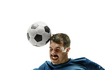 Image showing Close up of emotional man playing soccer hitting the ball with the head on isolated white background