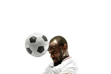 Image showing Close up of emotional man playing soccer hitting the ball with the head on isolated white background