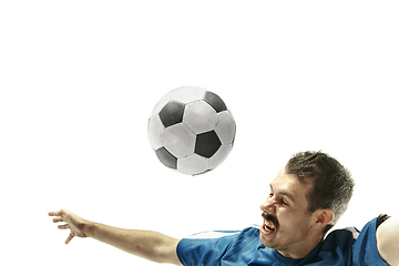 Image showing Close up of emotional man playing soccer hitting the ball with the head on isolated white background