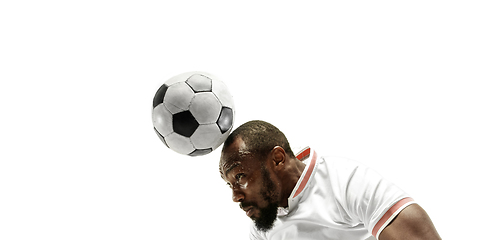 Image showing Close up of emotional man playing soccer hitting the ball with the head on isolated white background