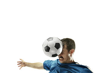 Image showing Close up of emotional man playing soccer hitting the ball with the head on isolated white background