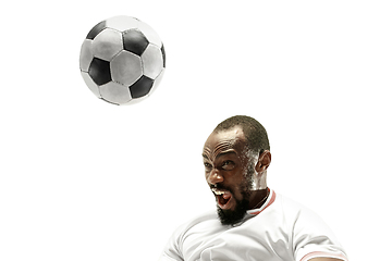 Image showing Close up of emotional man playing soccer hitting the ball with the head on isolated white background