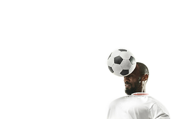 Image showing Close up of emotional man playing soccer hitting the ball with the head on isolated white background