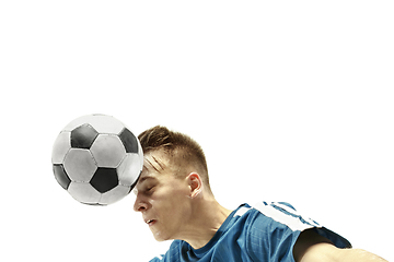 Image showing Close up of emotional man playing soccer hitting the ball with the head on isolated white background