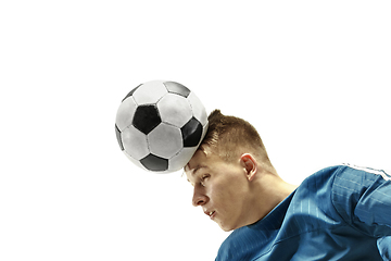 Image showing Close up of emotional man playing soccer hitting the ball with the head on isolated white background