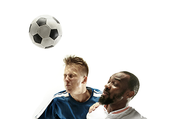 Image showing Close up of emotional men playing soccer hitting the ball with the head on isolated on white background