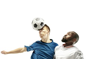 Image showing Close up of emotional men playing soccer hitting the ball with the head on isolated on white background