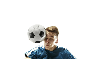 Image showing Close up of emotional man playing soccer hitting the ball with the head on isolated white background