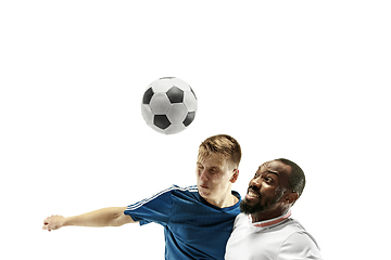 Image showing Close up of emotional men playing soccer hitting the ball with the head on isolated on white background