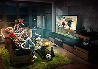 Image showing Group of friends watching TV, football match, sport together