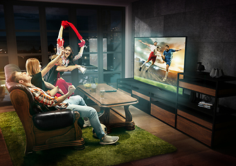 Image showing Group of friends watching TV, football match, sport together