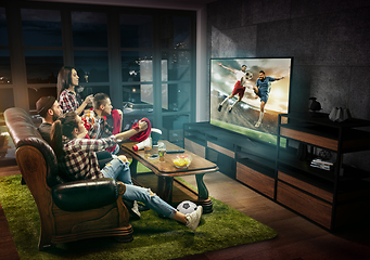 Image showing Group of friends watching TV, football match, sport together