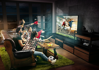 Image showing Group of friends watching TV, football match, sport together