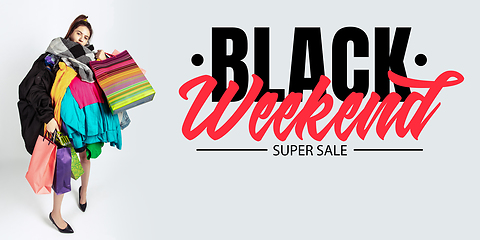 Image showing Woman addicted of sales and clothes, black weekend, sales concept