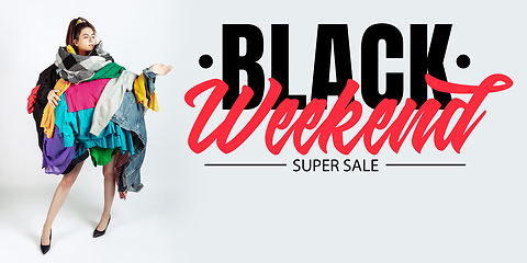 Image showing Woman addicted of sales and clothes, black weekend, sales concept