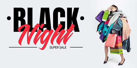 Image showing Woman addicted of sales and clothes, black night, sales concept