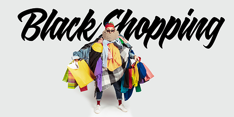 Image showing Man addicted of sales and clothes, black shopping, sales concept