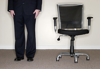 Image showing Businessman with Chair