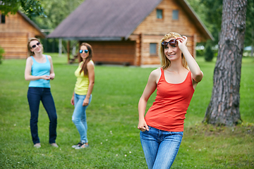 Image showing three girls having fun outdoors